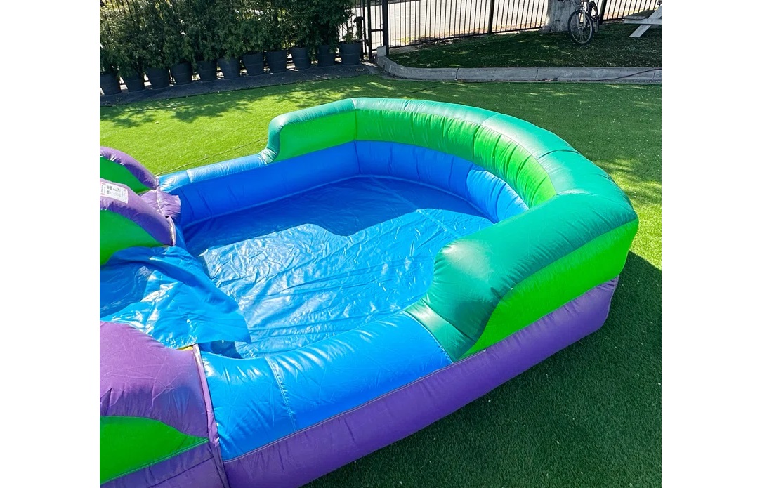 Tropical waterslide inflatable rental for backyard parties in Winnipeg Manitoba