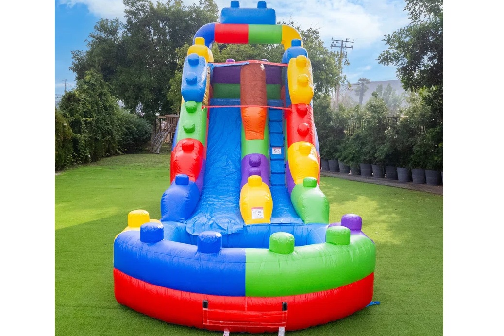 Colourful Mega Blocks waterslide bouncer rental in Winnipeg Manitoba and Kenora Ontario