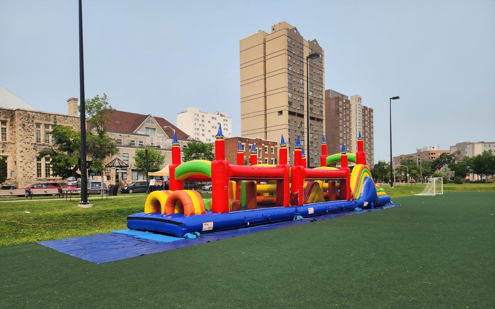 Rainbow Titan inflatable obstacle course rental for events in Winnipeg Manitoba