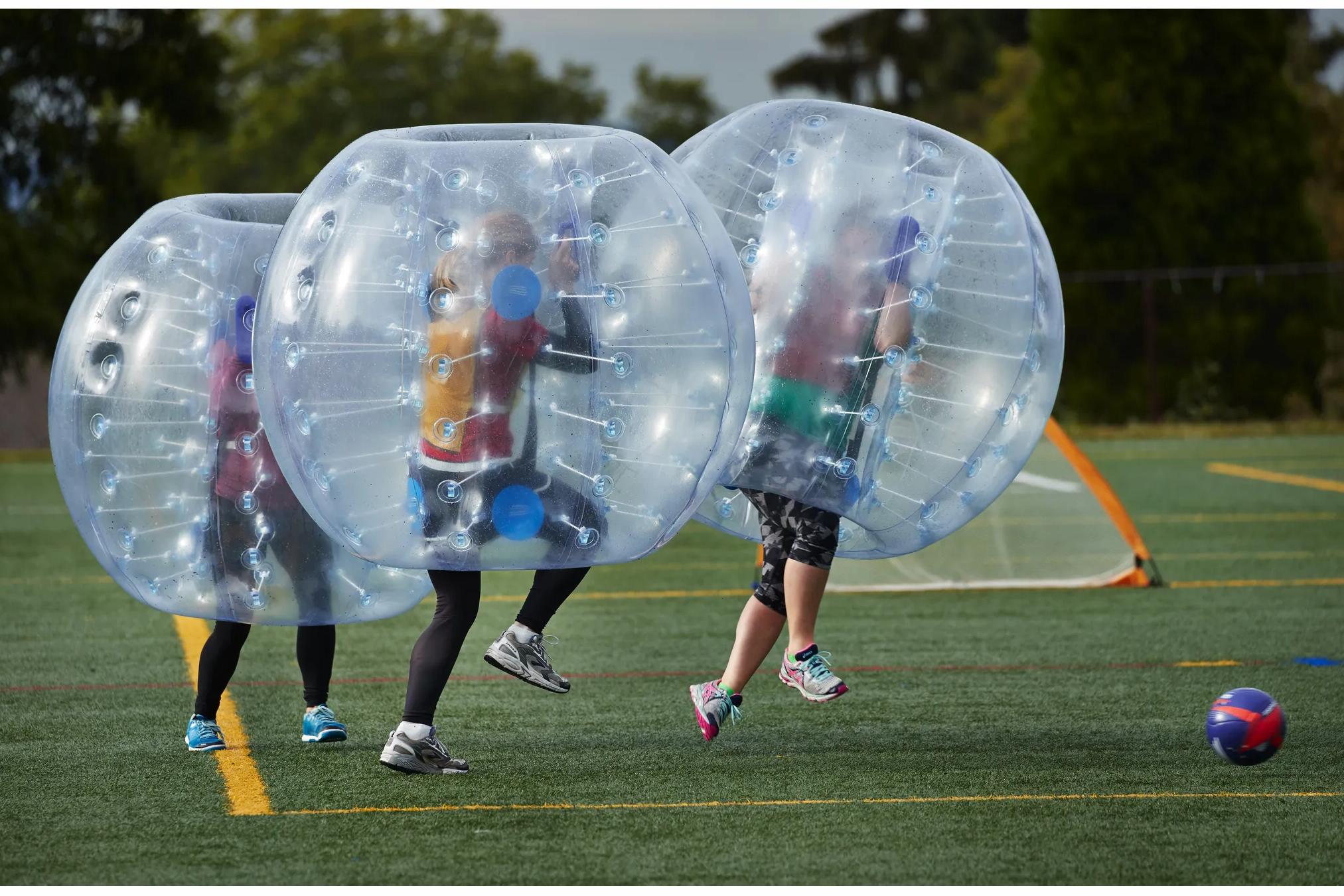 Bubble soccer rental in Winnipeg Manitoba with optional Soccer Field Inflatable Arena add-on