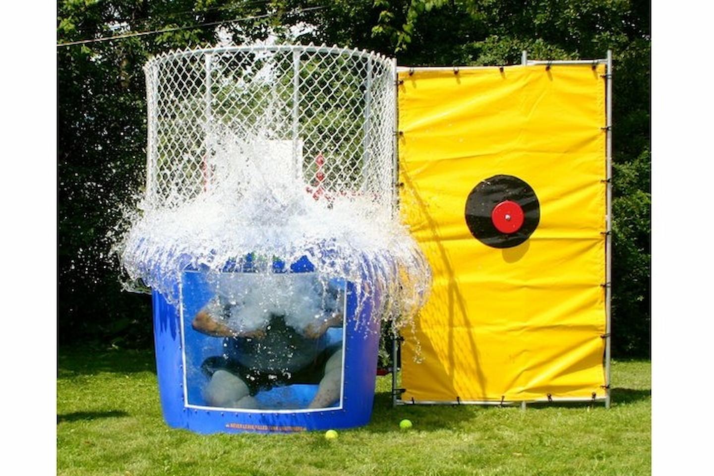 Jump Up Bouncers dunk tank setup at Winnipeg outdoor event