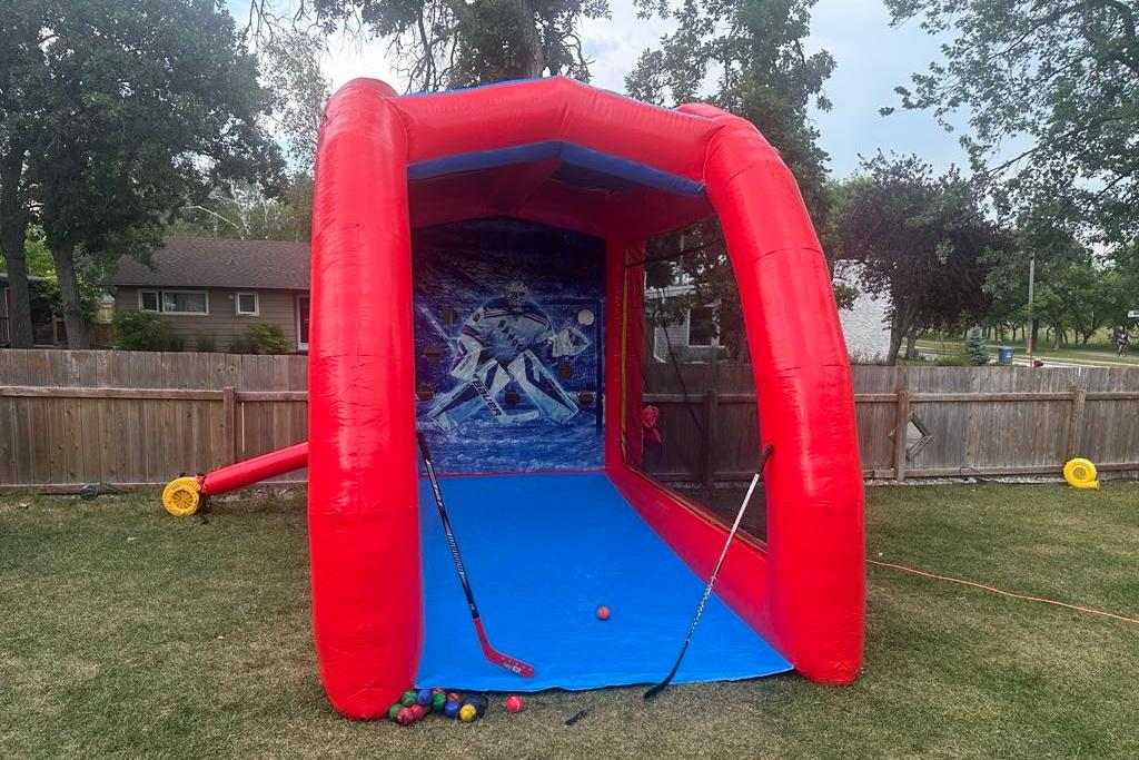 Hockey target game rental by Jump Up Bouncers in Manitoba and Kenora Ontario