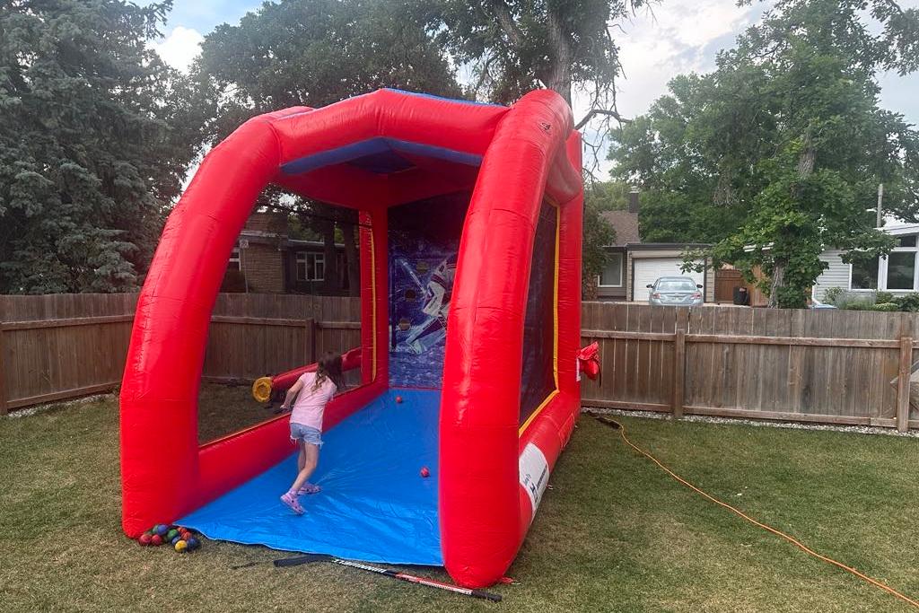 Inflatable hockey challenge game for school events and festivals in Winnipeg