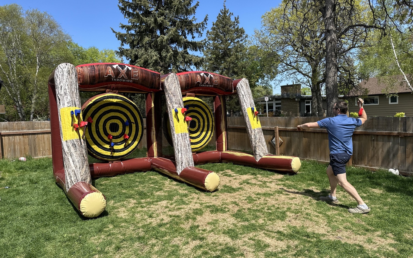 Inflatable axe throwing game rental in Winnipeg Manitoba for parties school events and corporate events