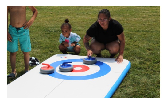 Inflatable curling party game rental in Winnipeg Manitoba for kids and adults