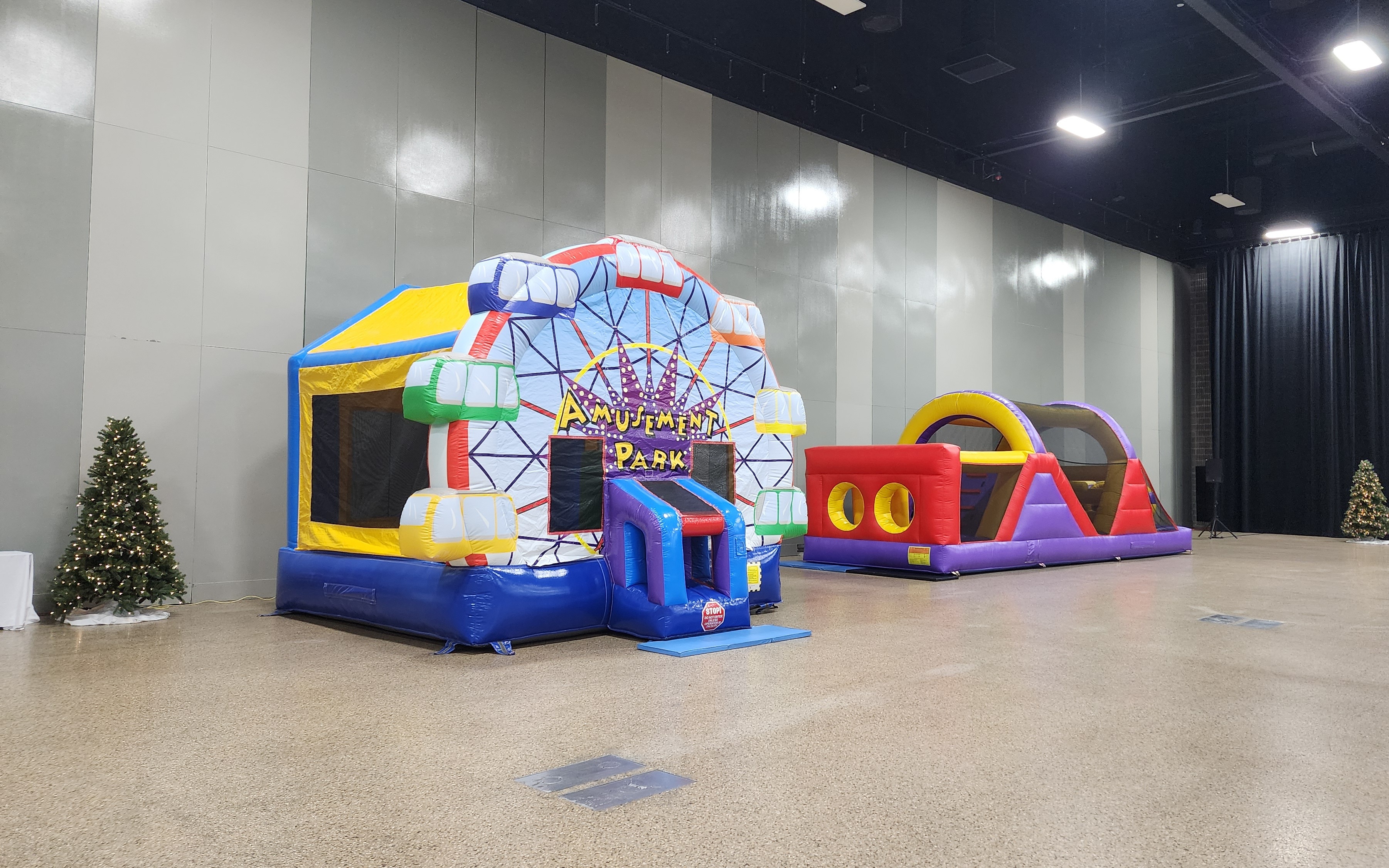 Dunk tank and outdoor inflatable game rentals for summer events in Winnipeg Manitoba