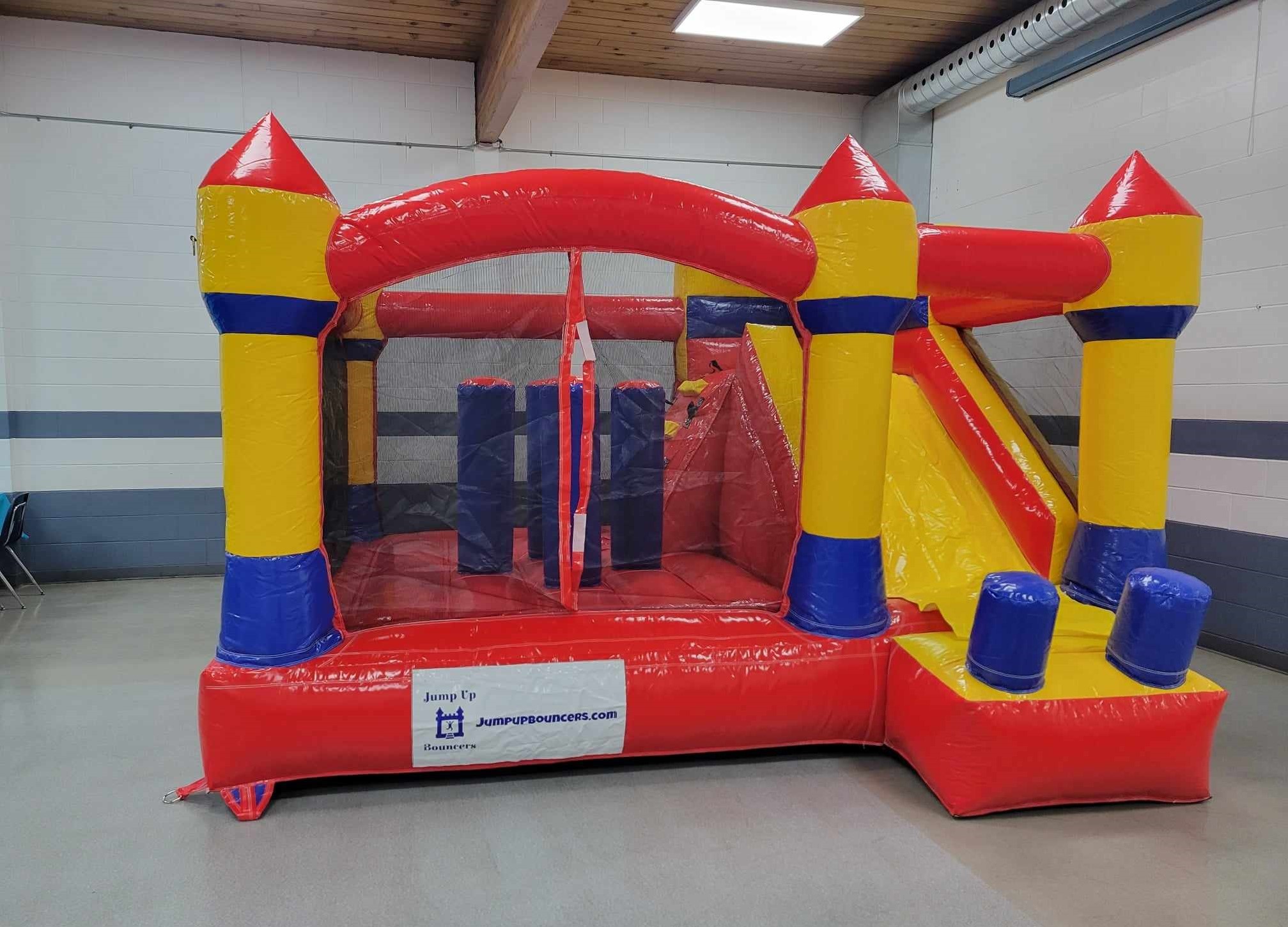 Compact yellow and red inflatable jump and slide bouncer for kids parties in Winnipeg