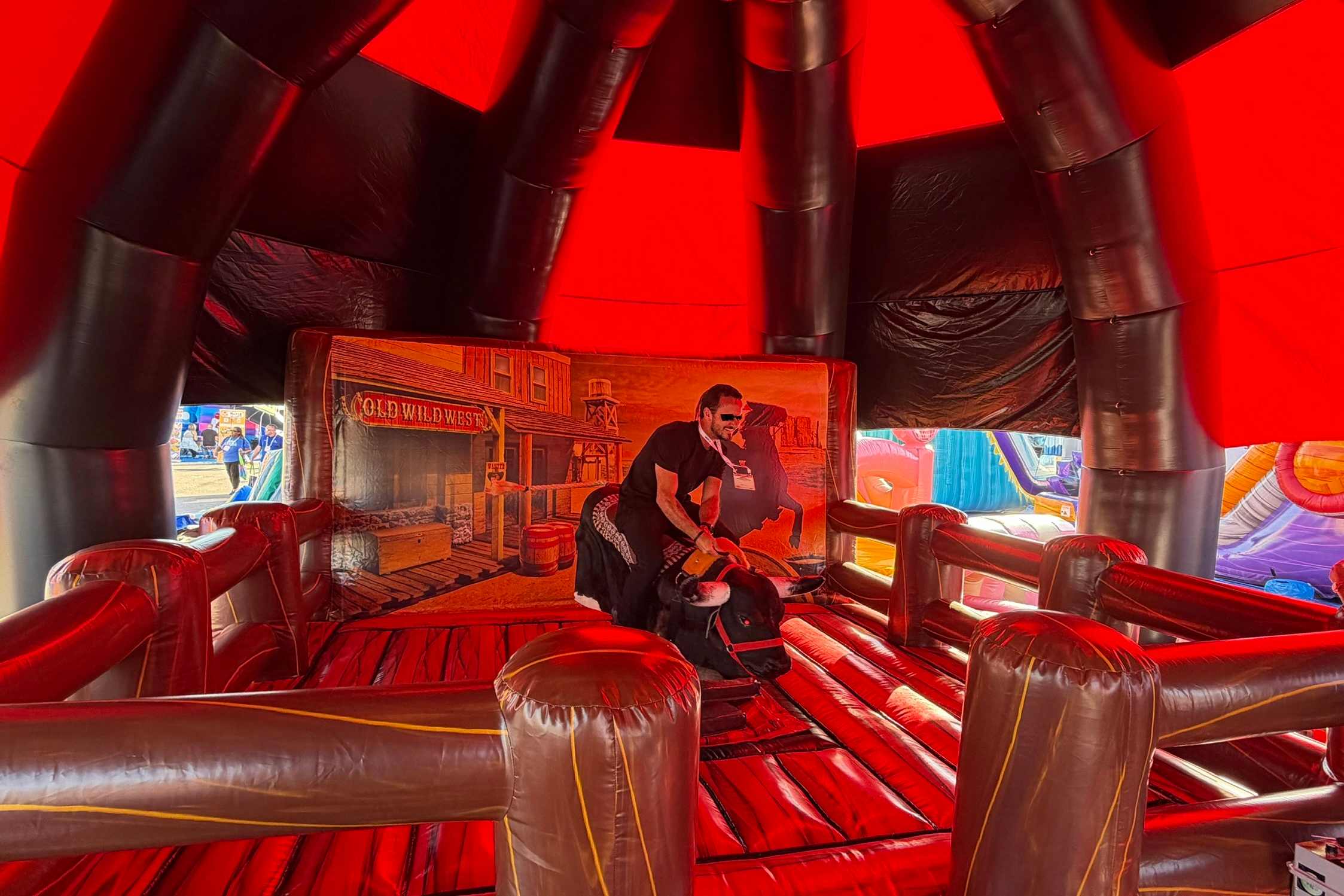 Bull ride rental with padded safety mat Winnipeg