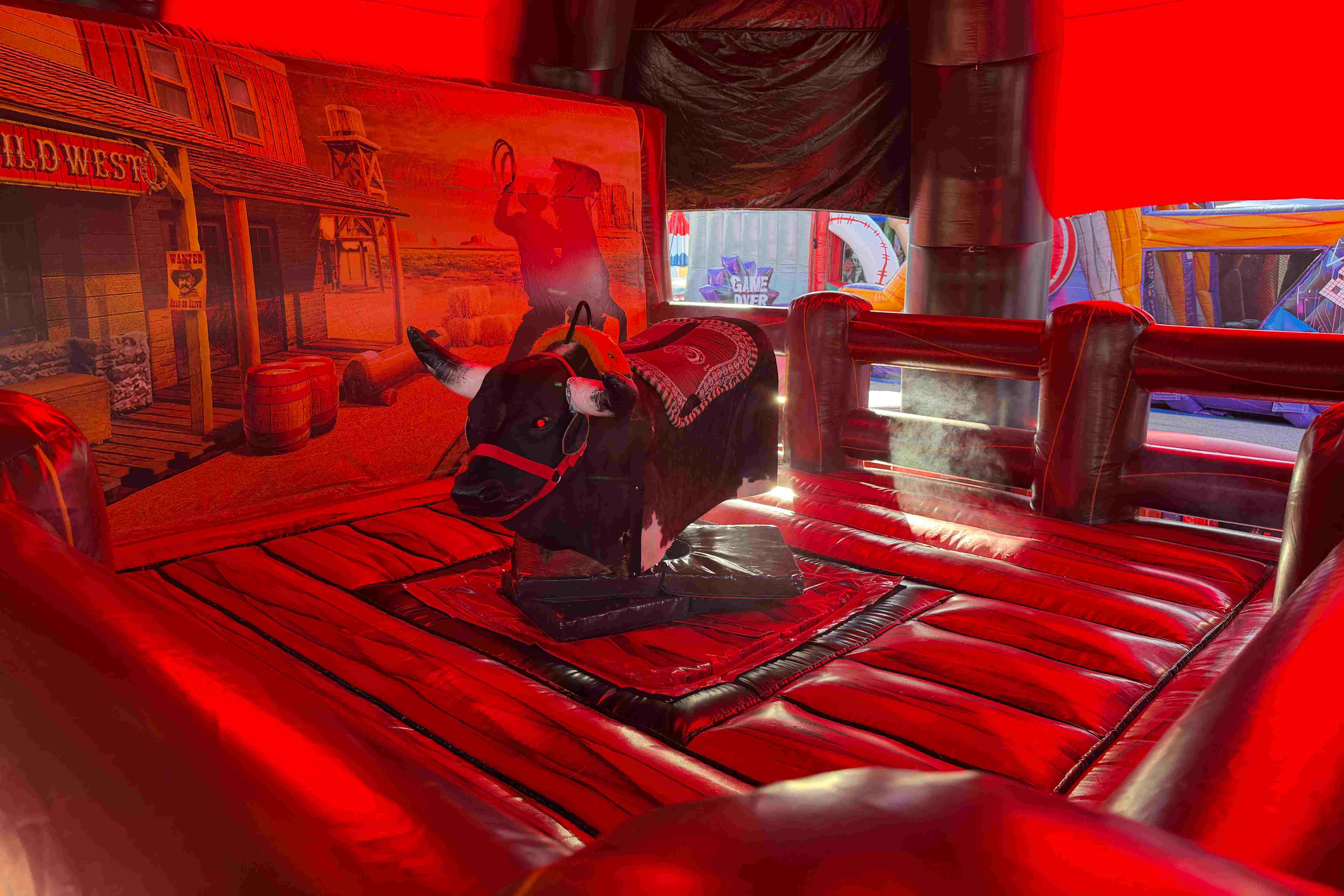 Professional mechanical bull setup by Jump Up Bouncers