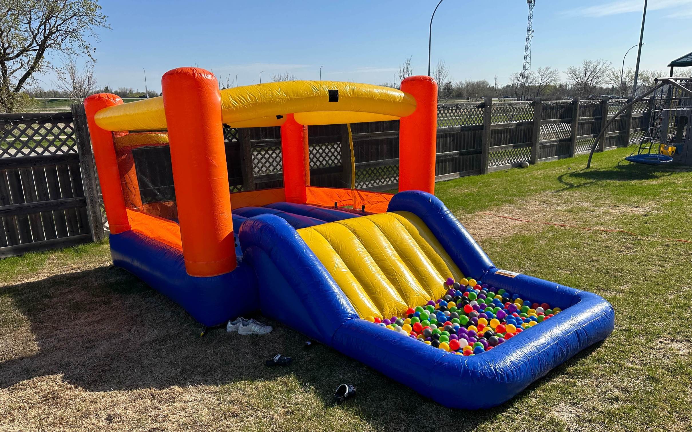 Orange Splash inflatable with bounce area slide and splash pool rental
