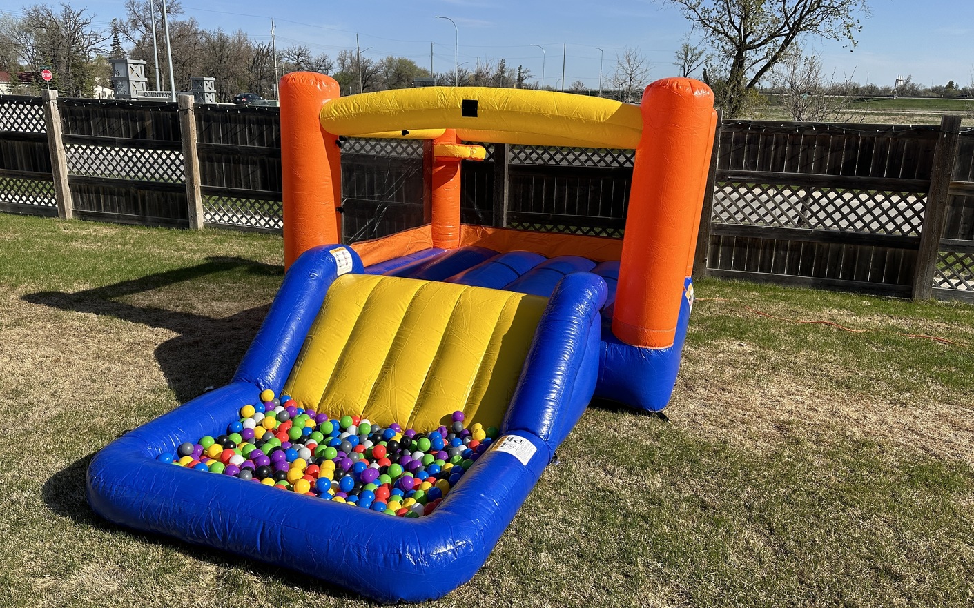 Orange Splash backyard inflatable rental by Jump Up Bouncers