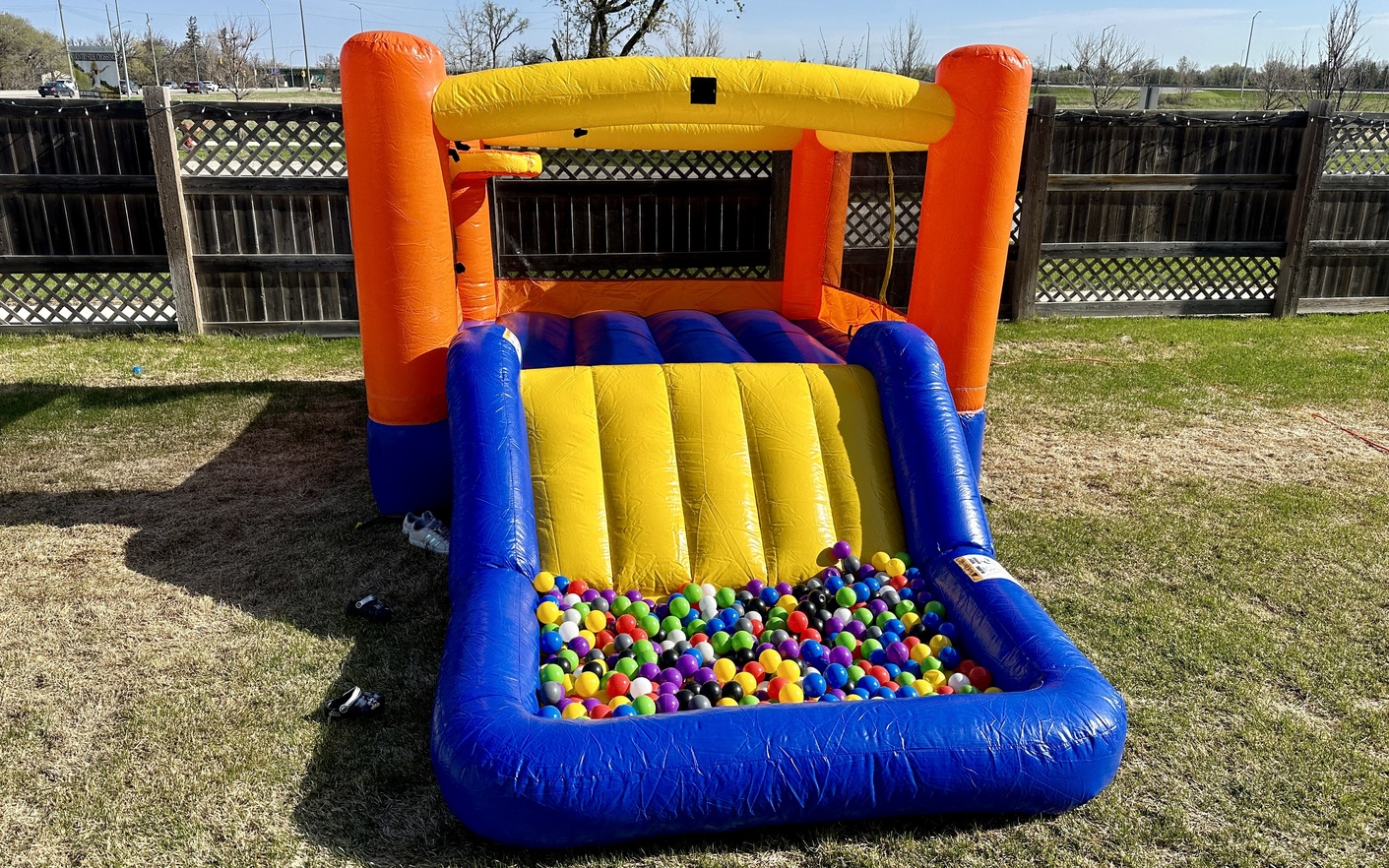 Inflatable orange splash combo bouncer rental for birthdays and events