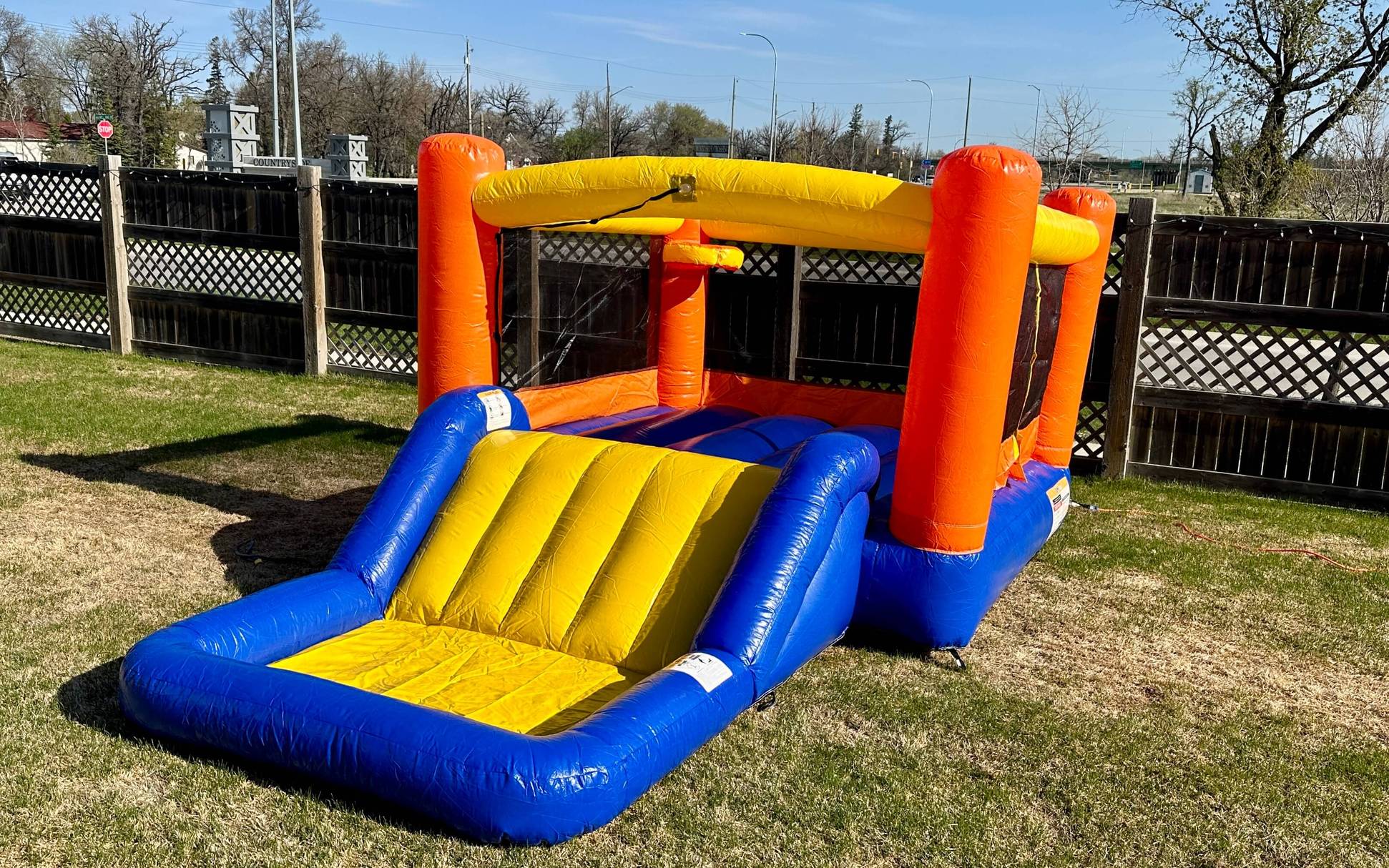 Wet dry inflatable slide and bounce house in Winnipeg Manitoba