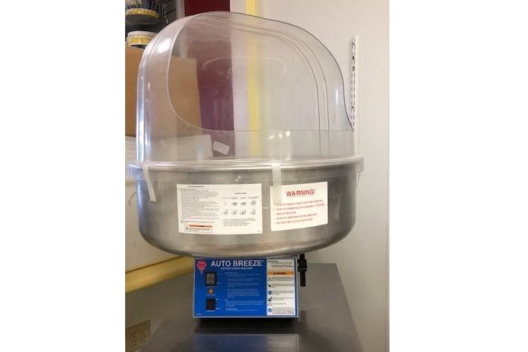 Cotton candy machine supplies and setup for party rentals
