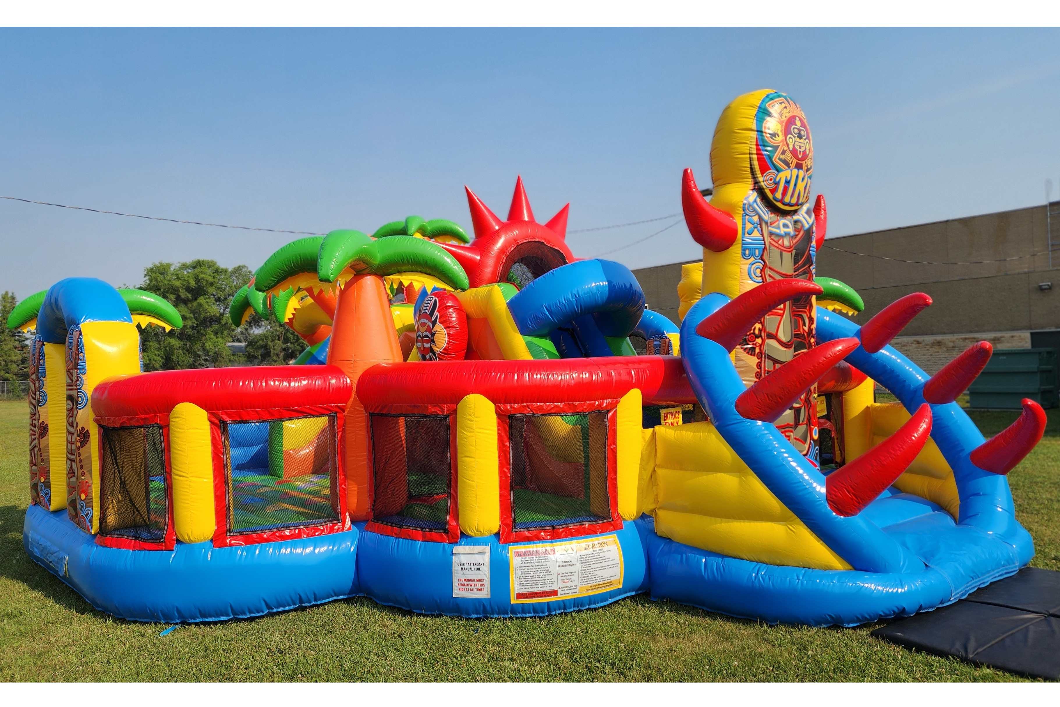 Tiki Island Mega Playground bounce house with obstacles and slides in Manitoba