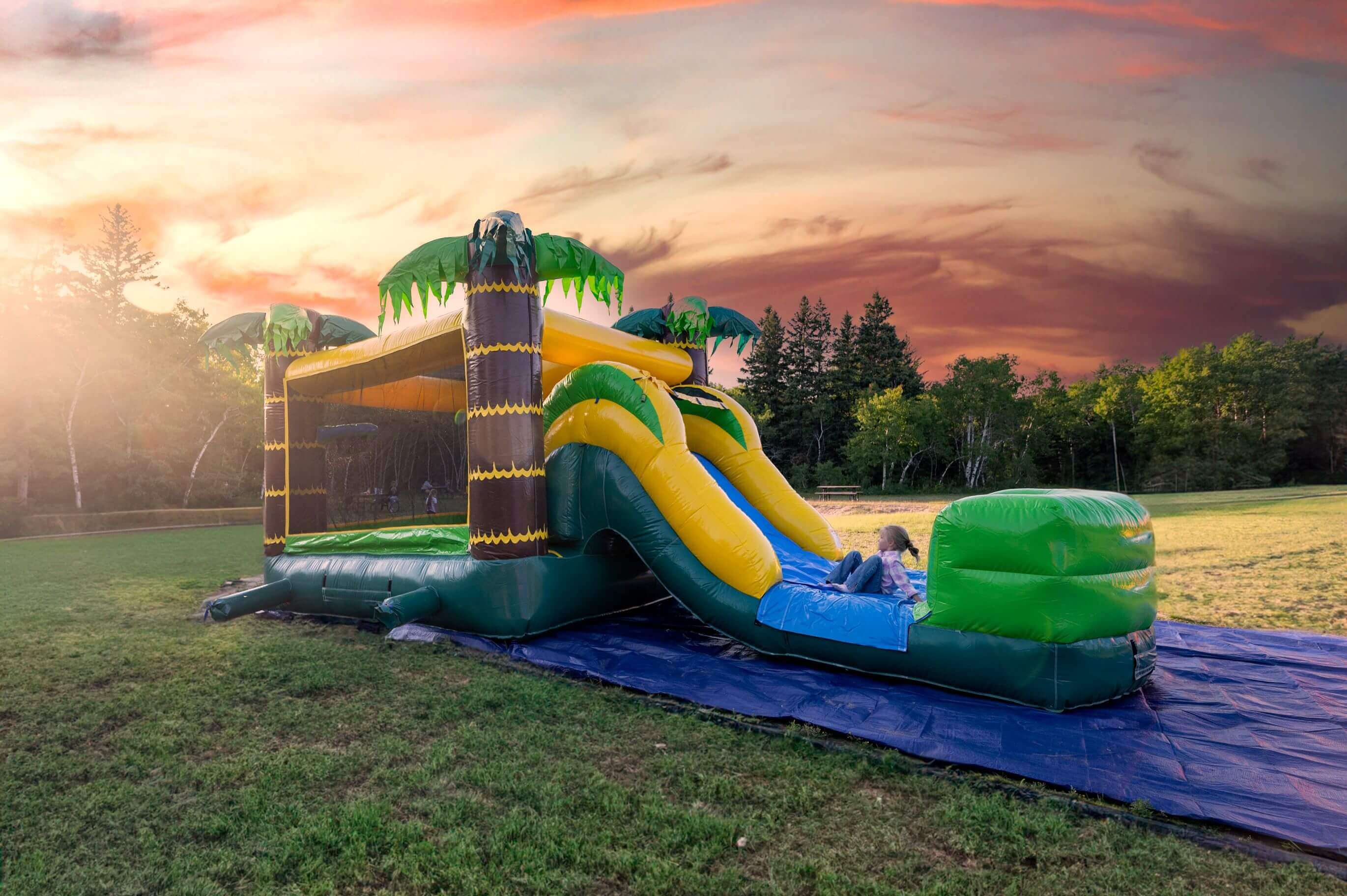Tropical combo bounce castle with slide and waterslide rental Winnipeg Manitoba