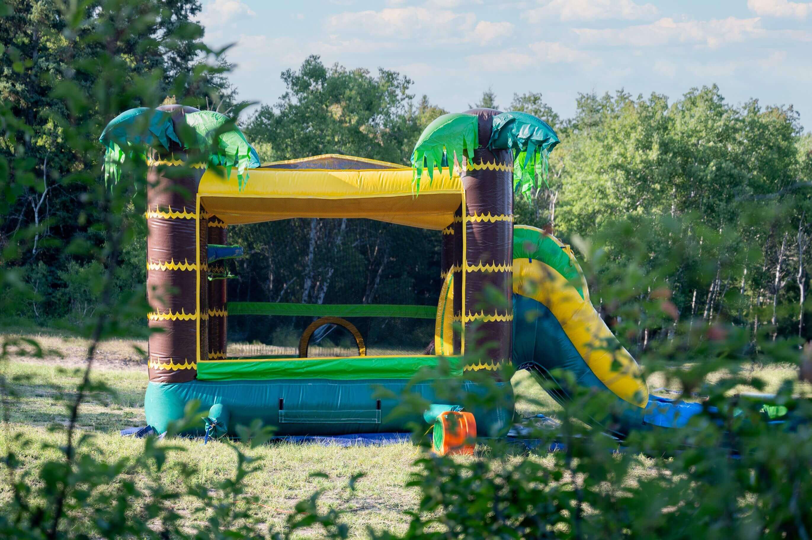 Jump Up Bouncers tropical combo waterslide rental for birthdays and summer events