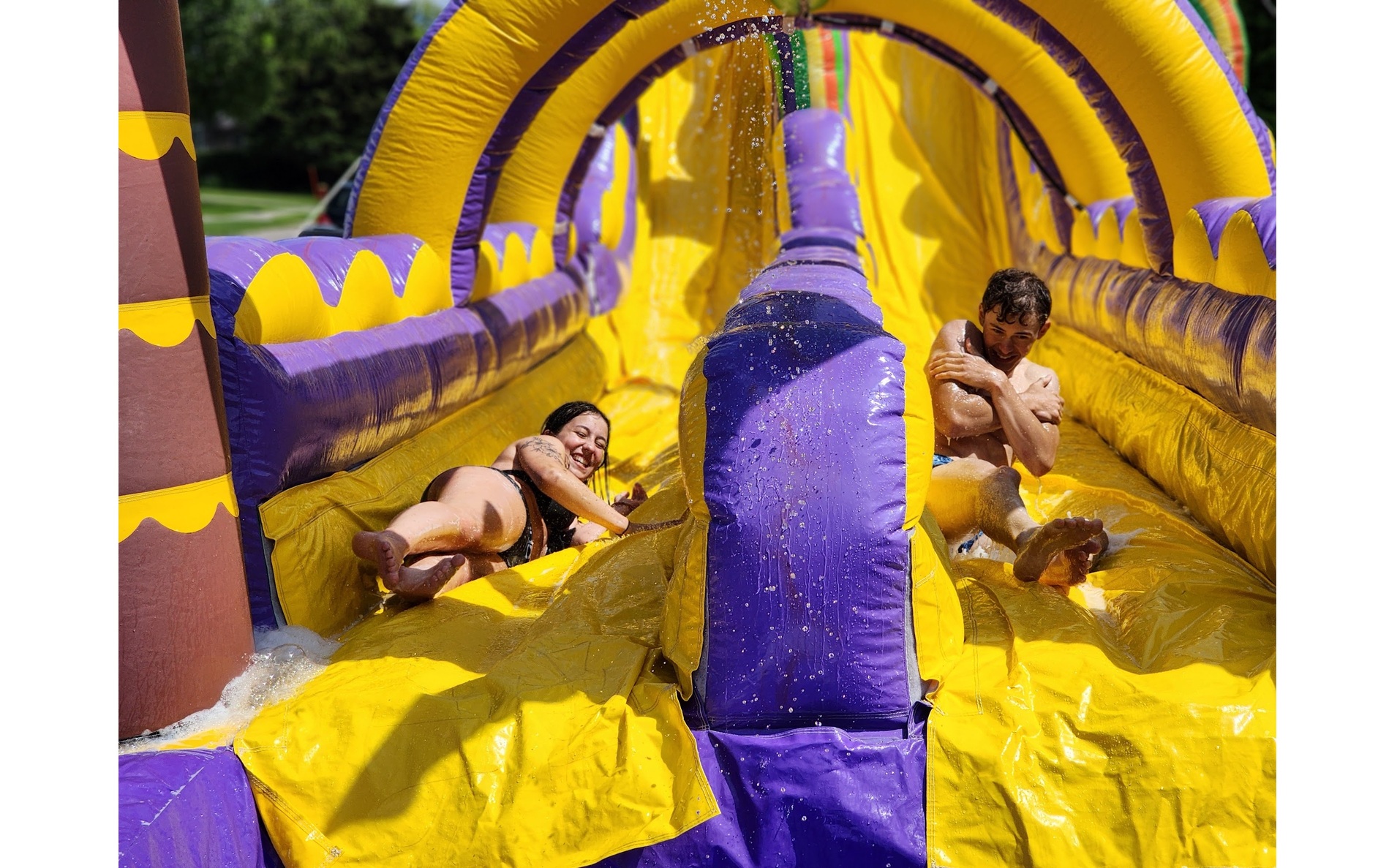 Giant tropical dual lane inflatable waterslide for rent in Winnipeg and Kenora