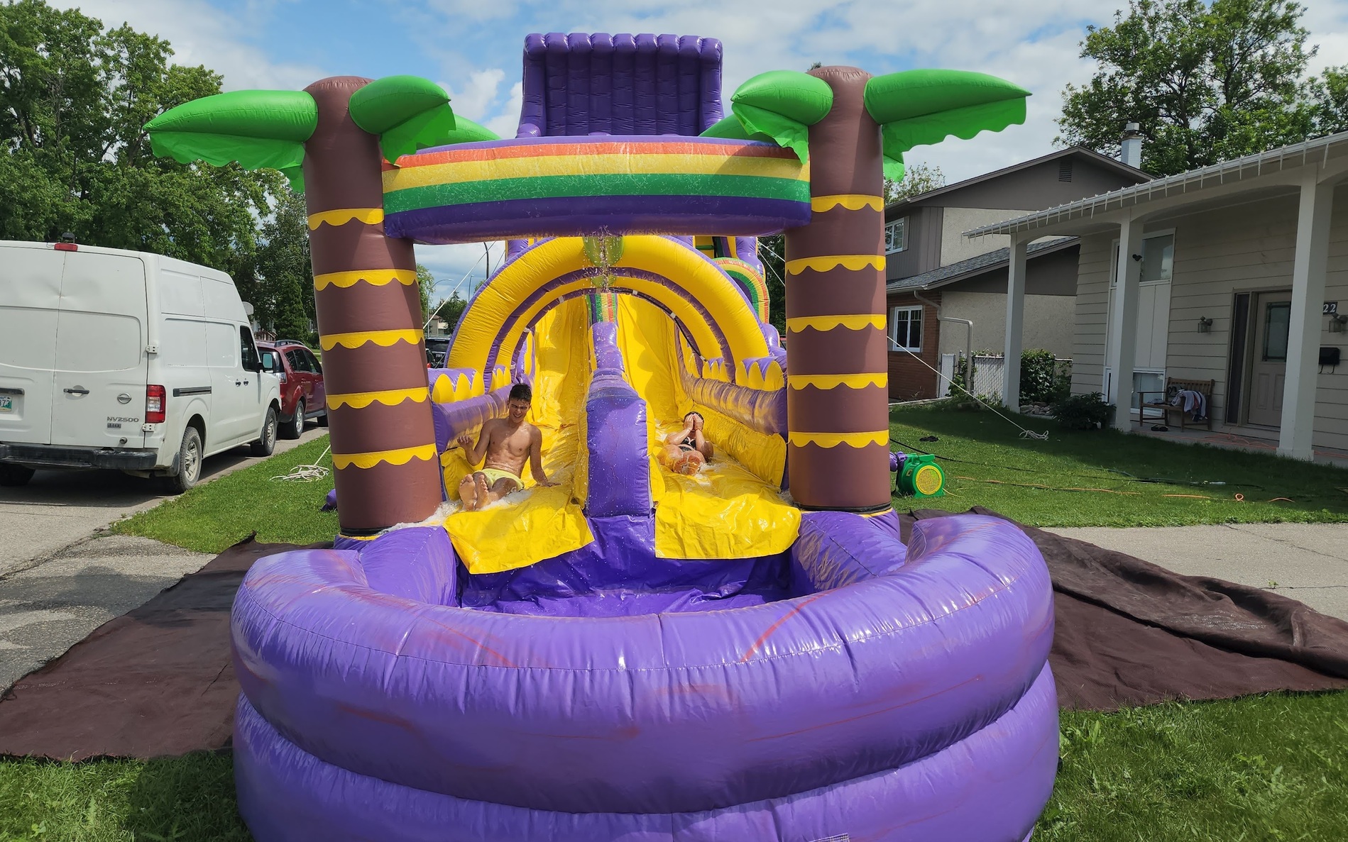 26 foot tall dual lane waterslide with slip and slide extension rental in Manitoba