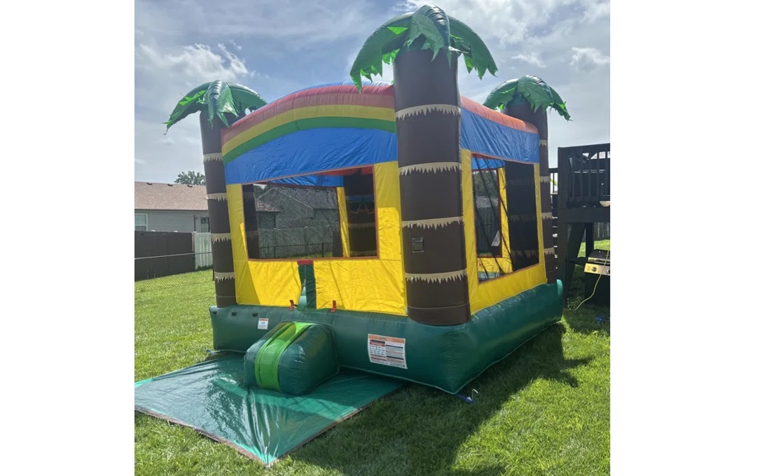 Enclosed tropical bouncer with safety netting rental Winnipeg Manitoba