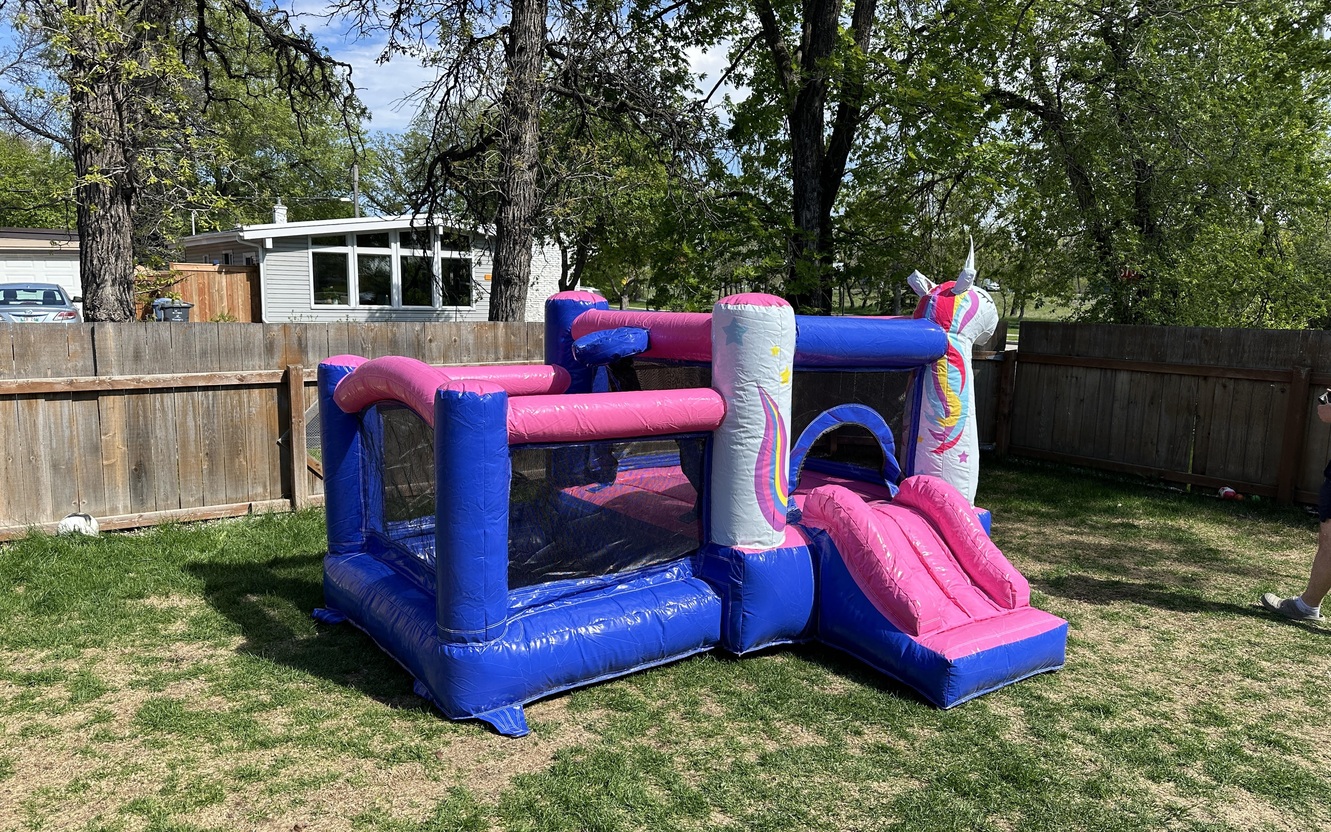 Small unicorn inflatable bouncer with slide and ball pit in Manitoba