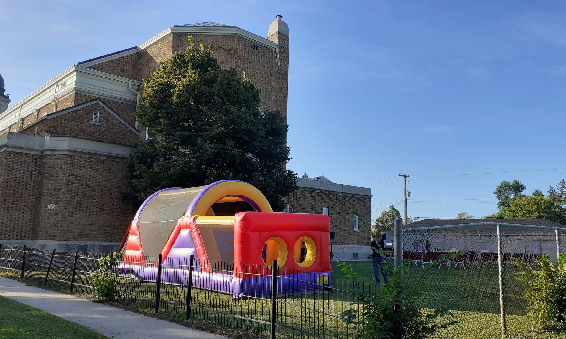 Kids obstacle course bouncer with climbing wall and slide