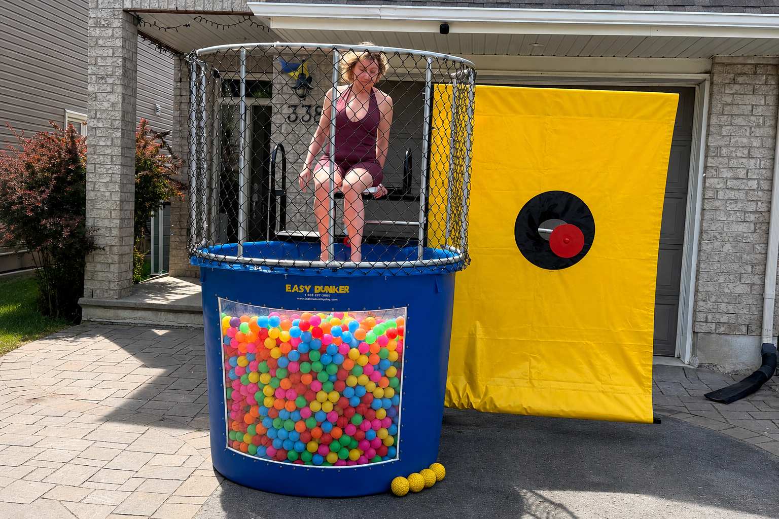 Dry dunk tank with pit balls rental in Winnipeg Manitoba for indoor parties winter events fundraisers and school events