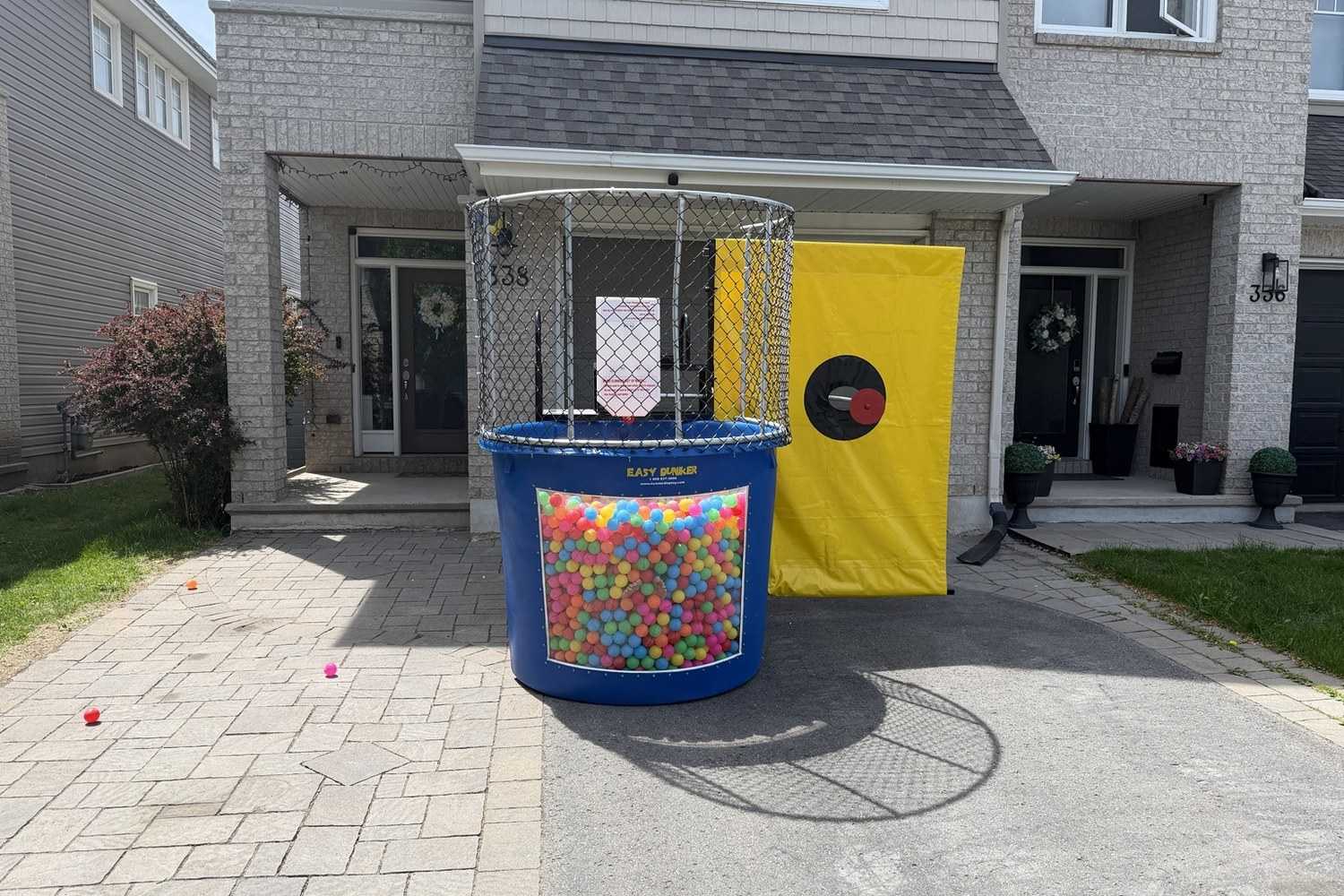 Indoor-friendly dry dunk tank party game rental for fundraisers in Winnipeg