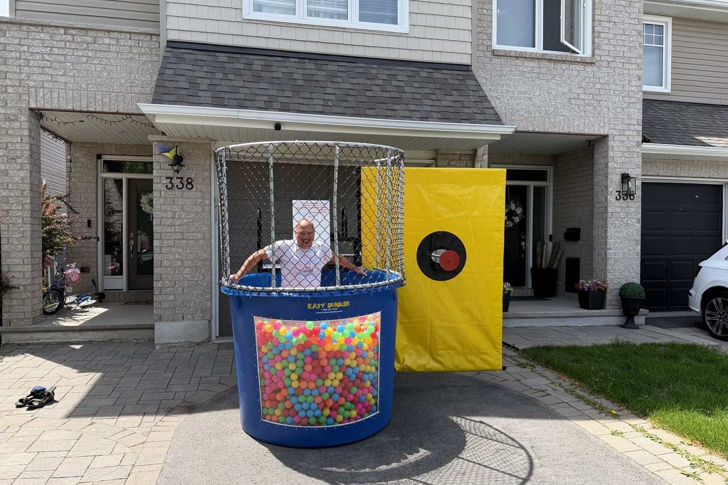 Any-weather dry dunk tank rental for winter events and indoor venues in Winnipeg