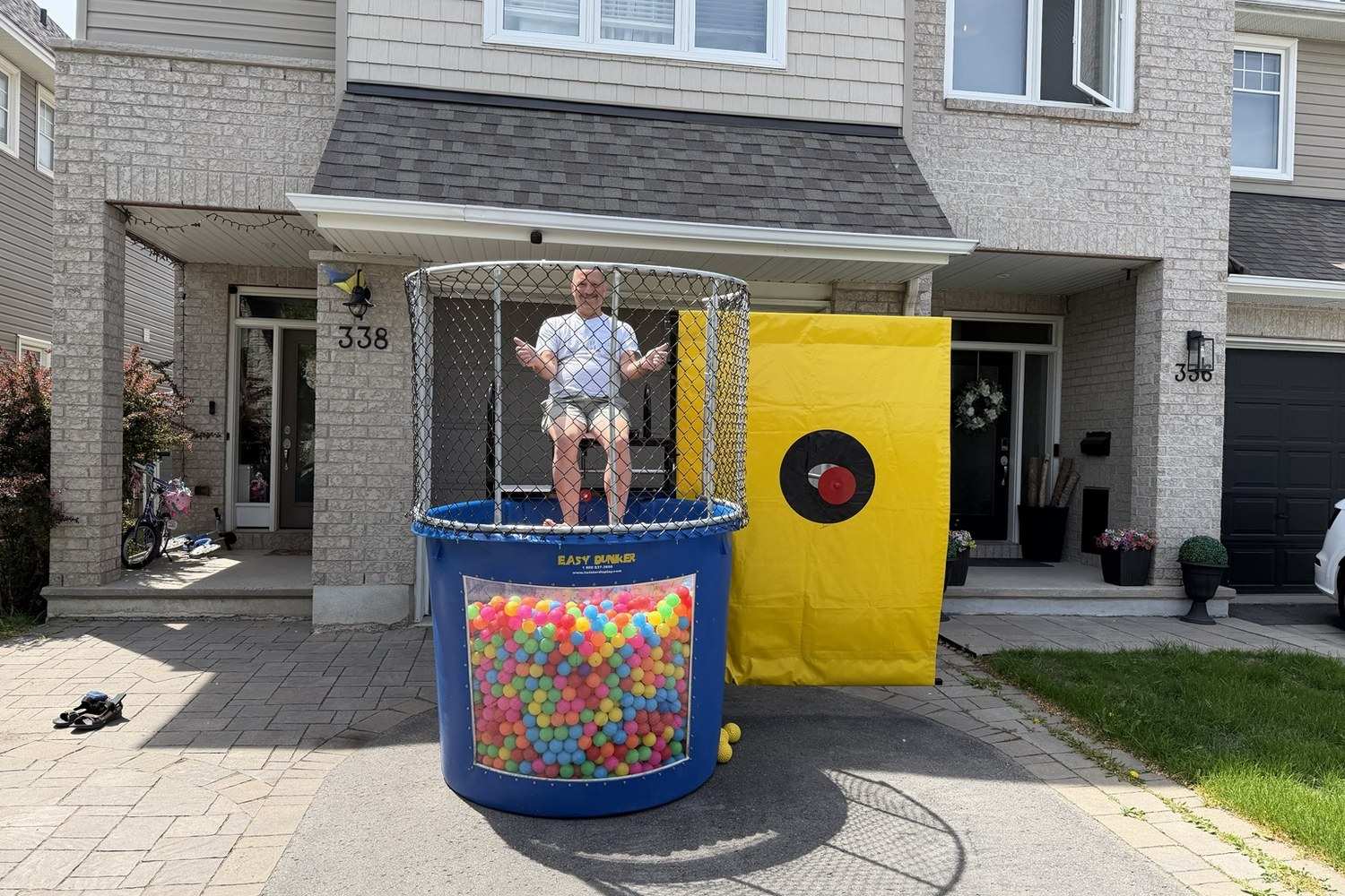 Dry dunk tank party game rental for kids teens and adults with supervision in Winnipeg