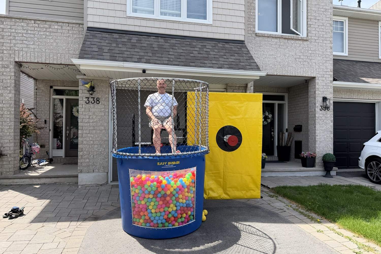 Jump Up Bouncers dry dunk tank with pit balls setup for Winnipeg events