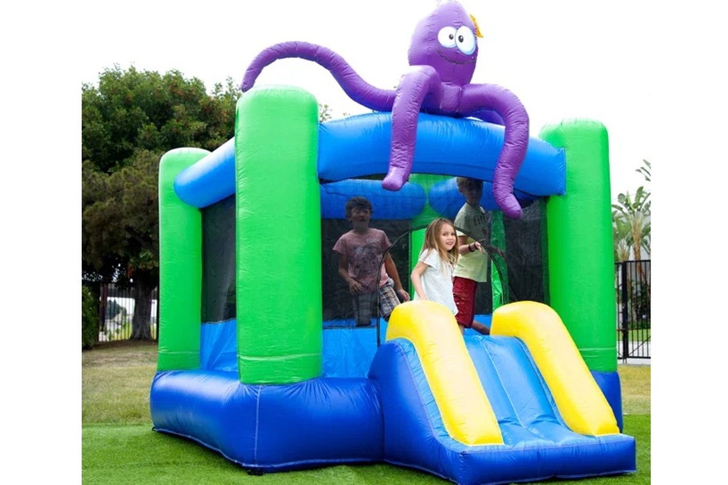 Octopus inflatable bounce house with slide for birthday party rentals in Winnipeg Manitoba
