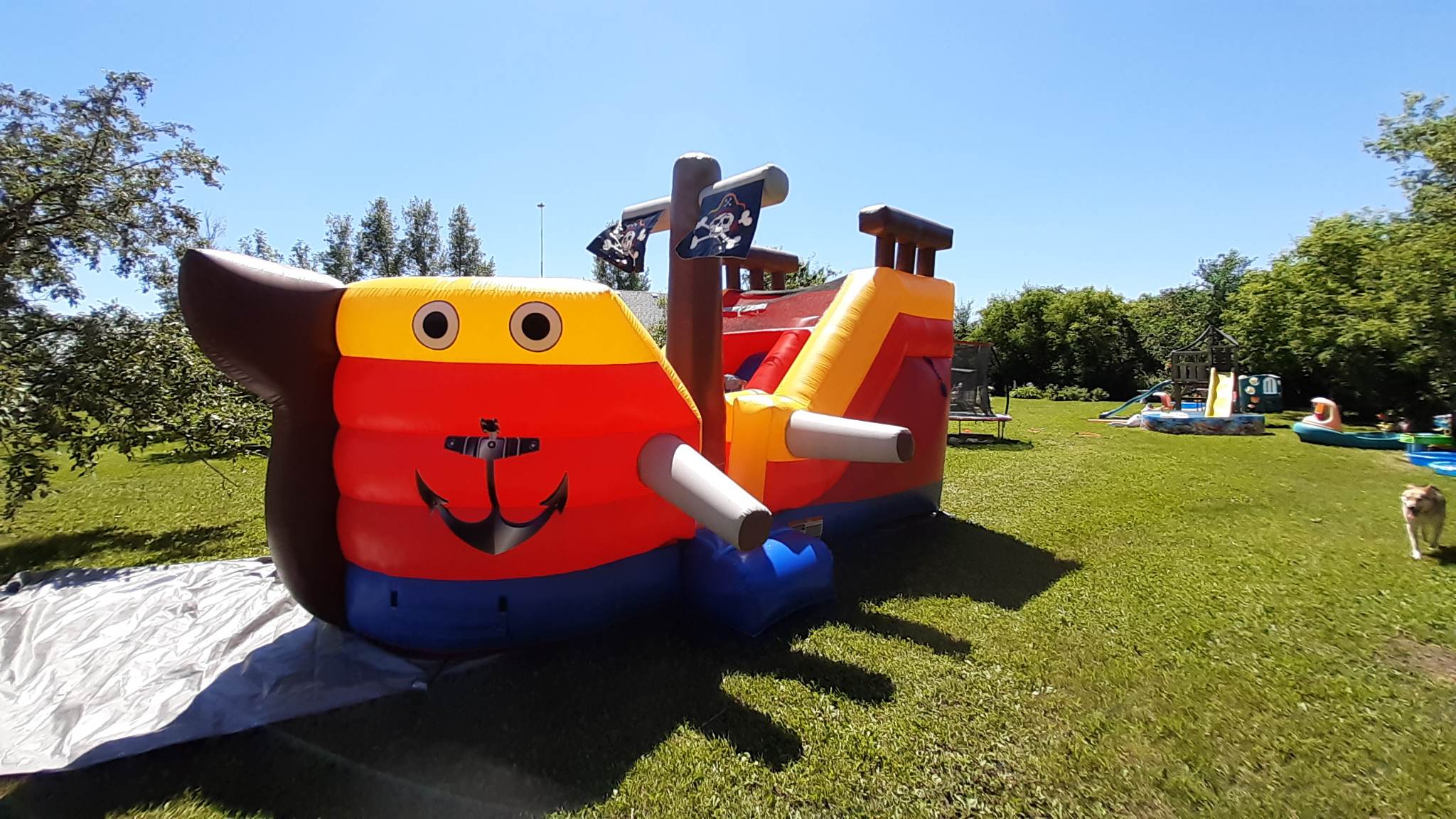 Pirate themed inflatable bouncer with slide by Jump Up Bouncers
