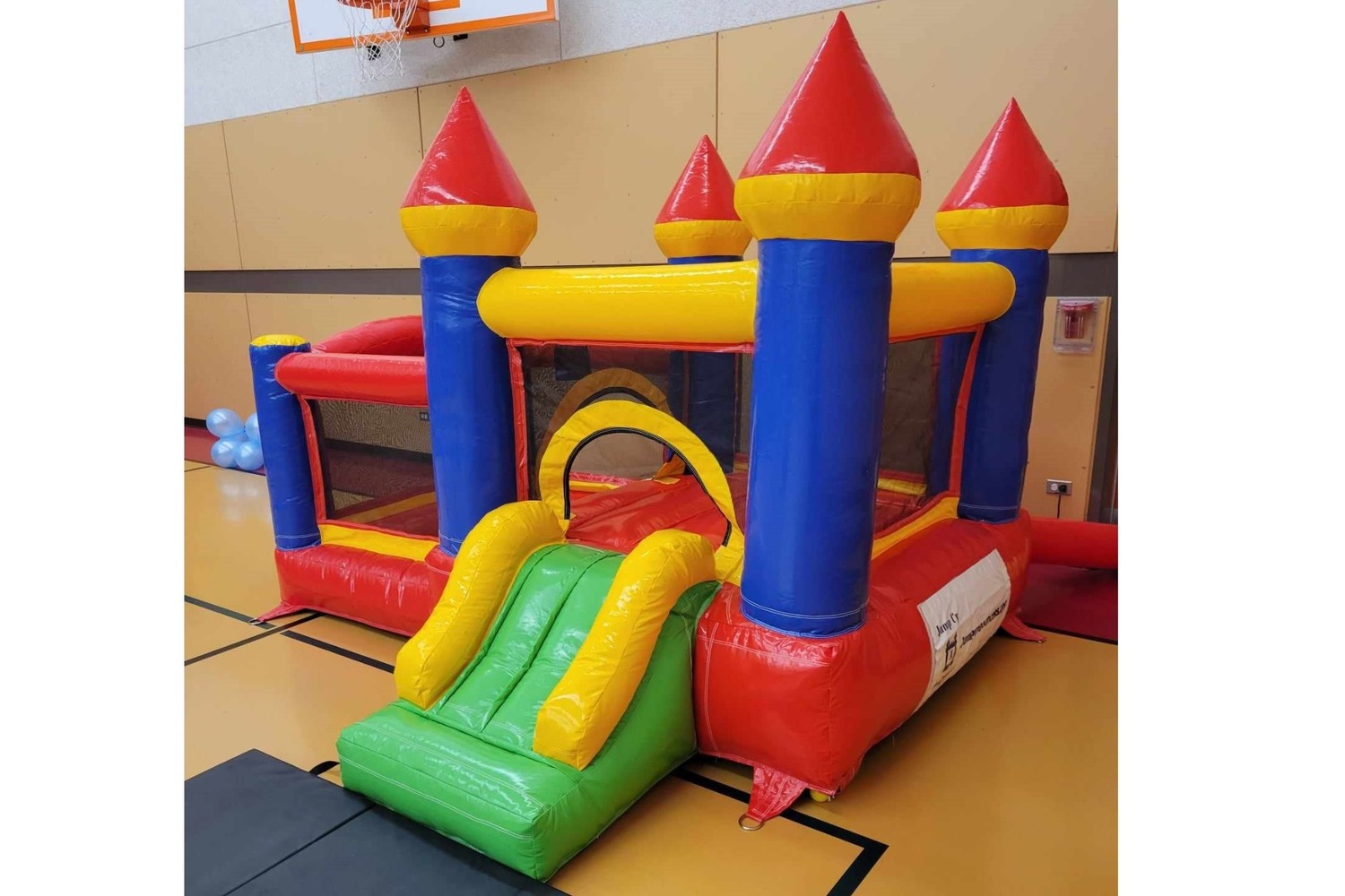 Small toddler bounce house rental Winnipeg Manitoba with slide and ball pit area