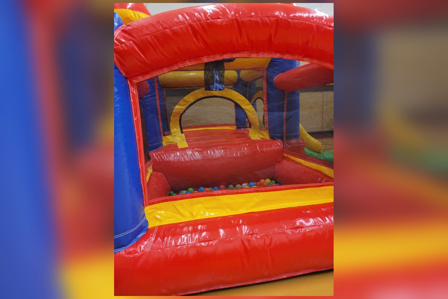 Tiny bounce house with basketball hoop and slide rental Winnipeg Manitoba